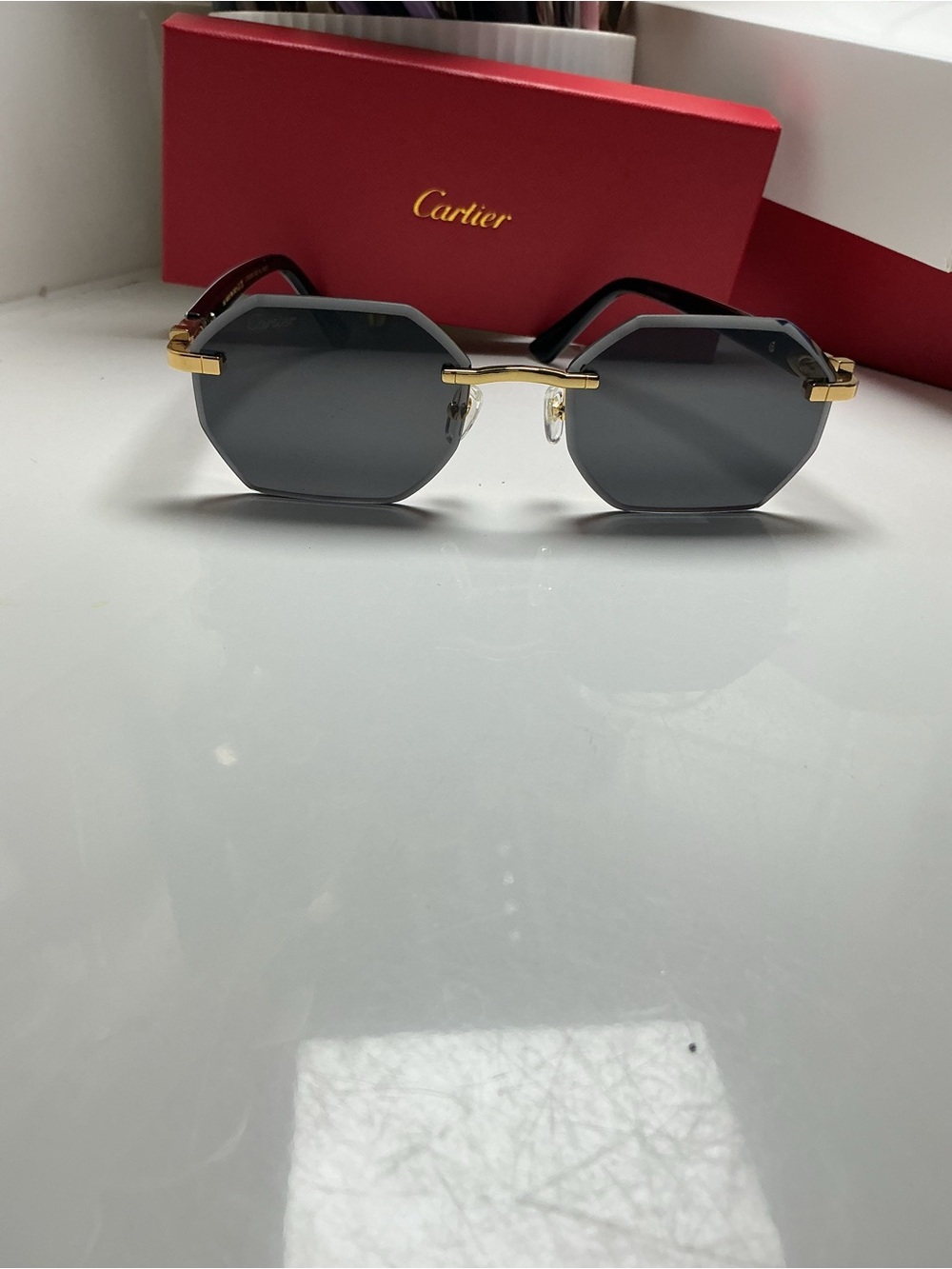 Cartier CT0439S 002 C Décor rimless sunglasses